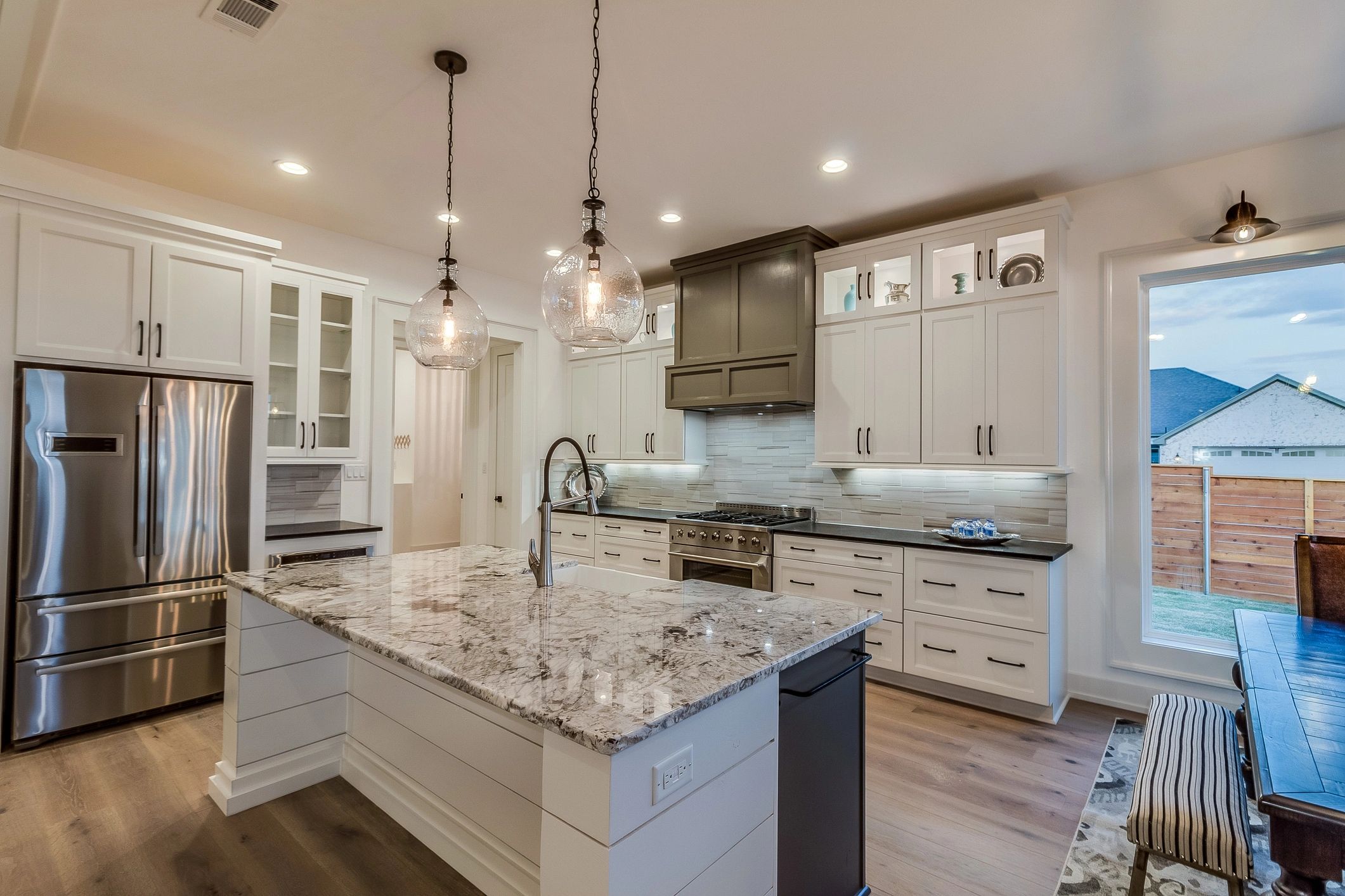 Modern kitchen remodel with updated cabinets and finishes.